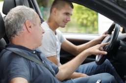 young man having a accompanied driving lesson Begleitetes Fahren