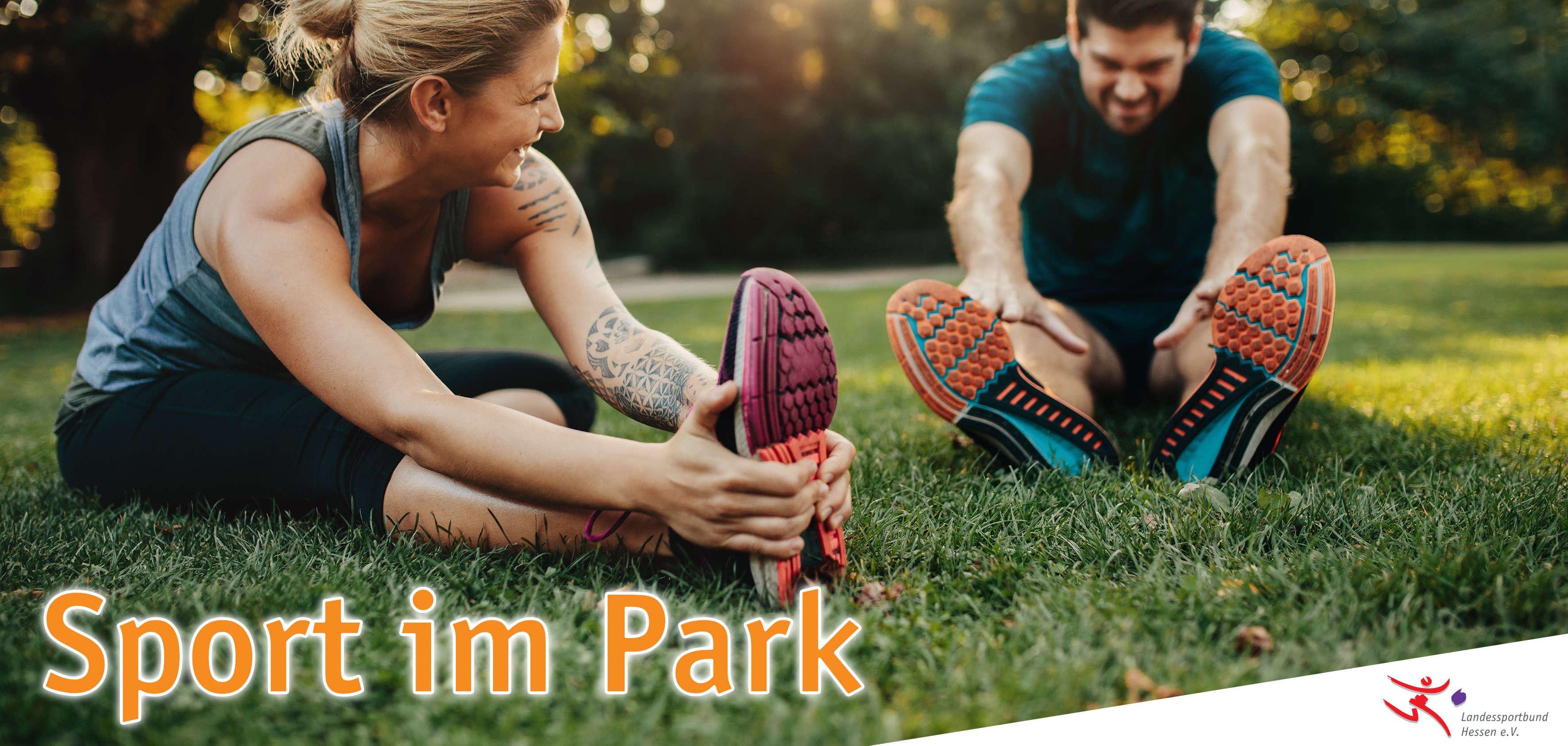 Young caucasian couple exercising in park