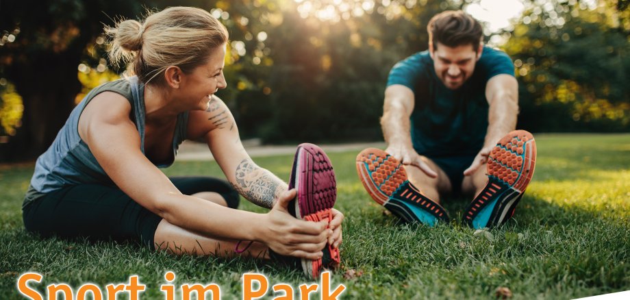 Young caucasian couple exercising in park